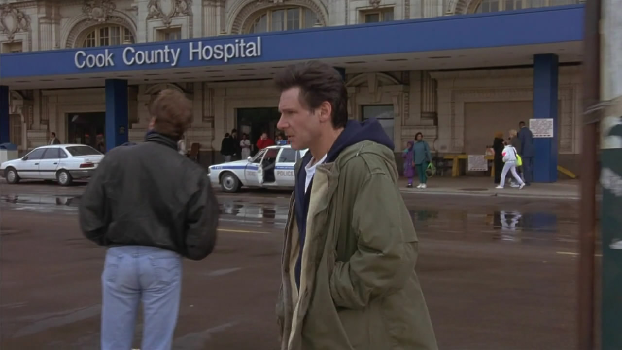 Harrison Ford in front of hospital in The Fugitive